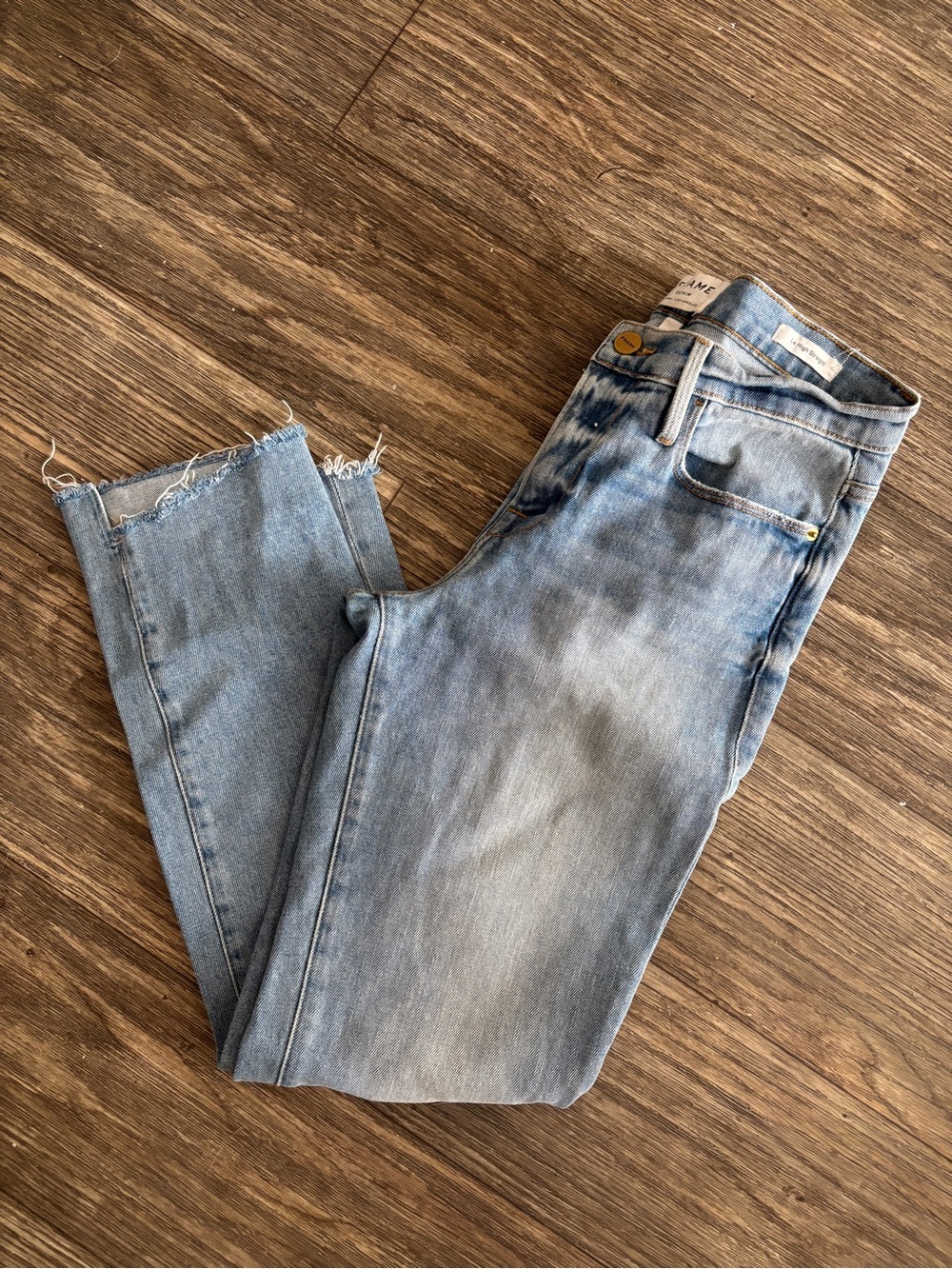 Frame Denim Light Blue Skinny Jeans with Raw Hem